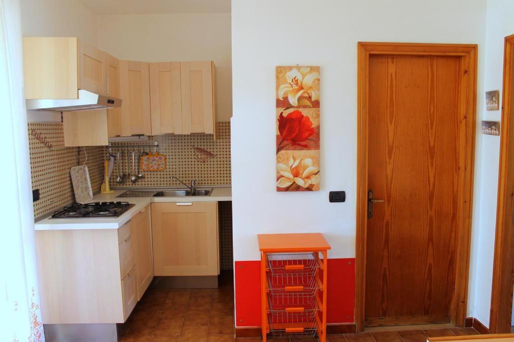 Kuchyň nebo kuchyňský kout v ubytování Lacona Mare - HelloElba