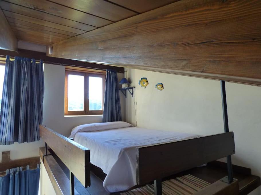 Postel nebo postele na pokoji v ubytování Hotel Albergue Bioclimático Sabinares del Arlanza
