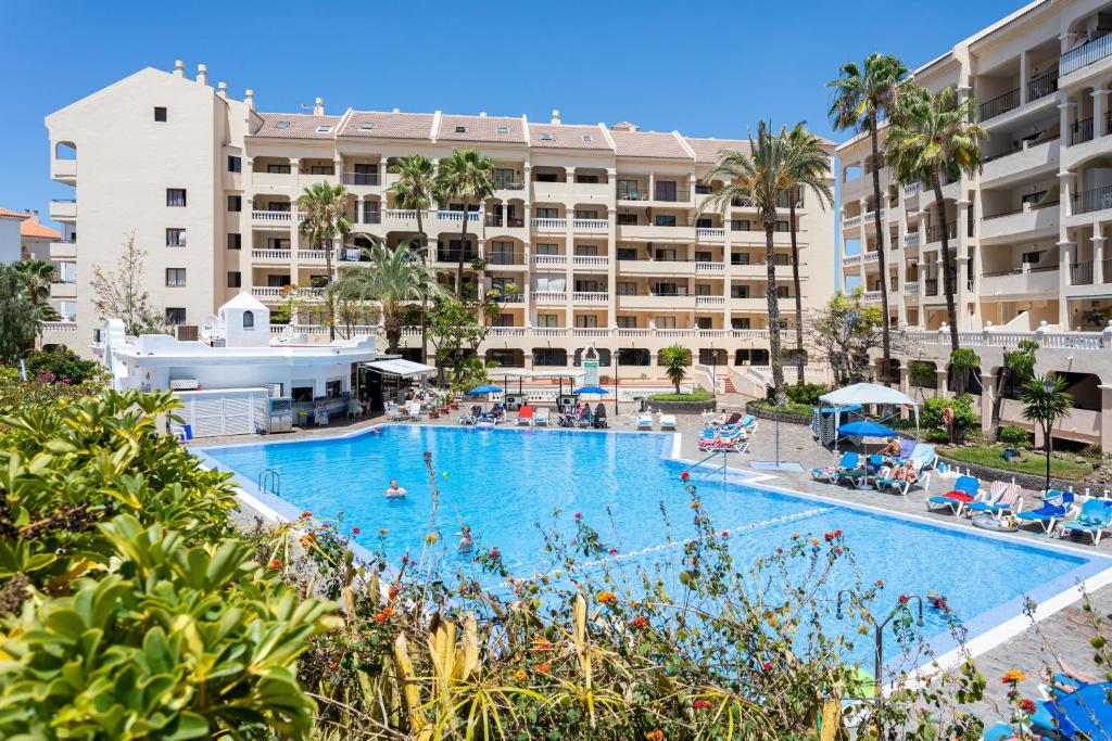 an image of a swimming pool at a resort at Listen THE STARS 505 - Los cristianos in Los Cristianos