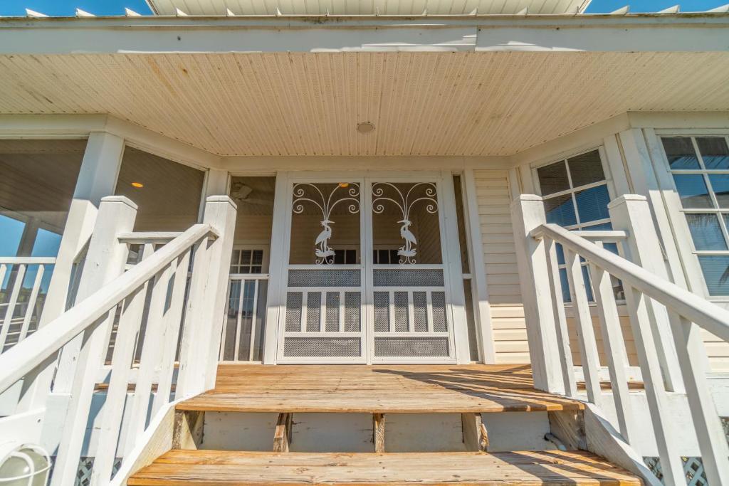 a front porch of a house with a door at Placida Villa #12538 in Cape Haze