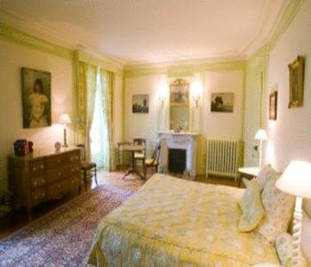 Postel nebo postele na pokoji v ubytování Château de Sarceaux