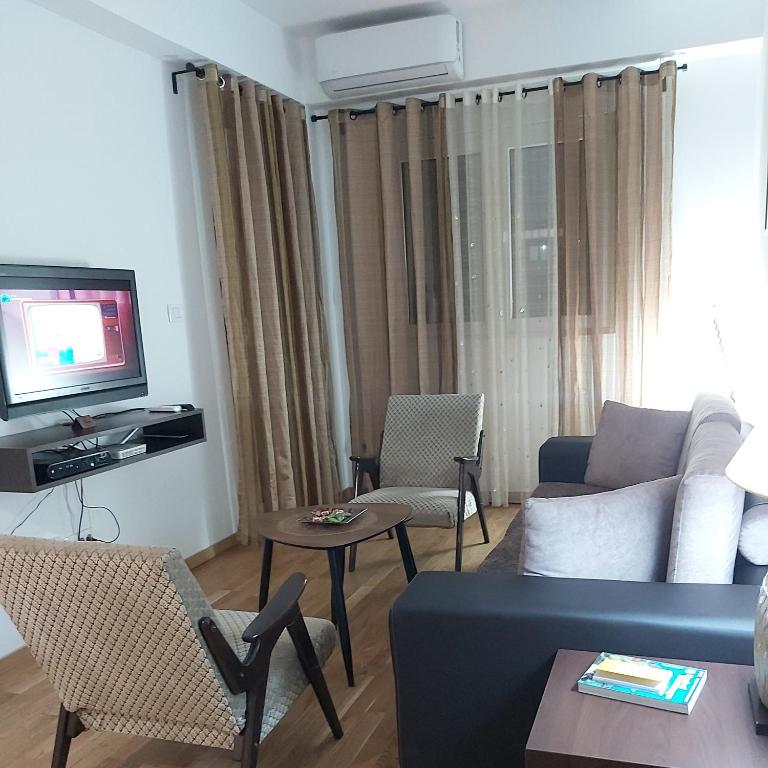 TV a/nebo společenská místnost v ubytování Apartman Miss T