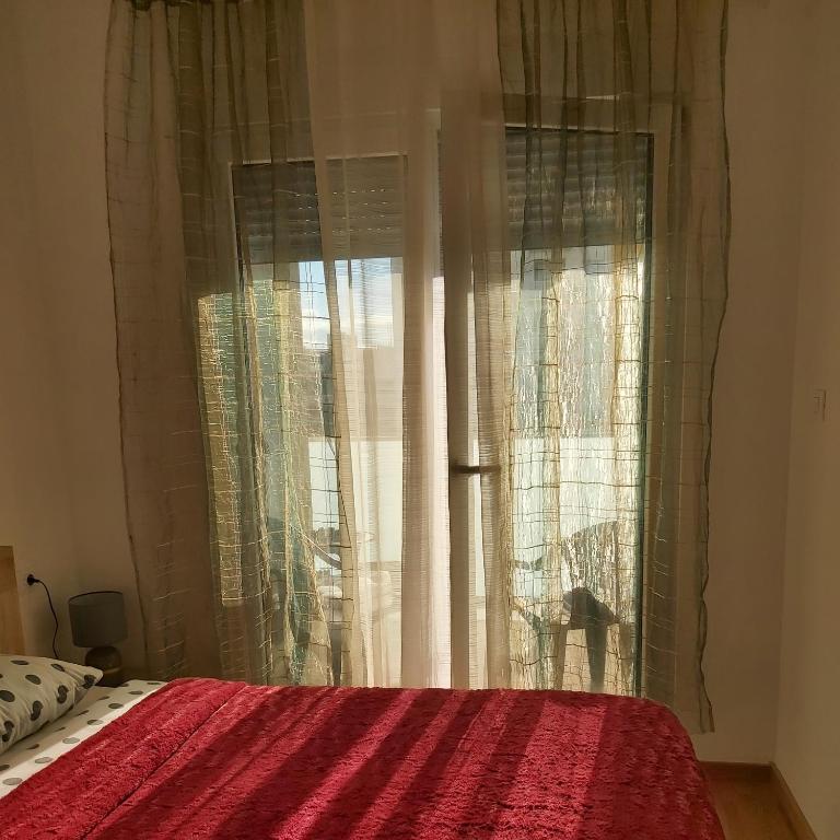 Postel nebo postele na pokoji v ubytování Apartman Miss T