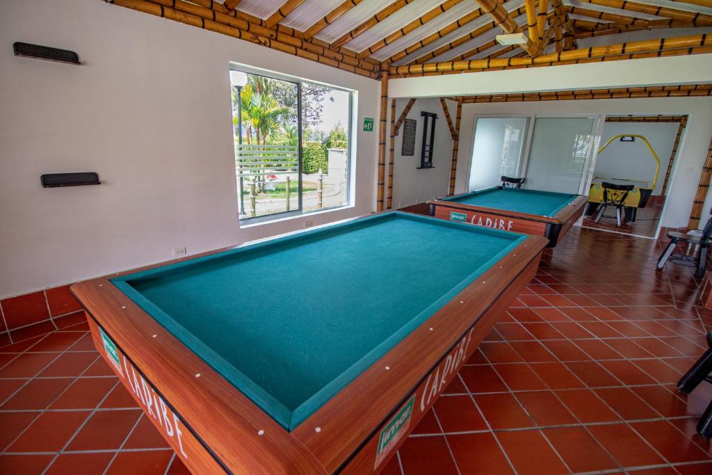 Biliár nebo kulečník v ubytování Hotel Campestre las Camelias