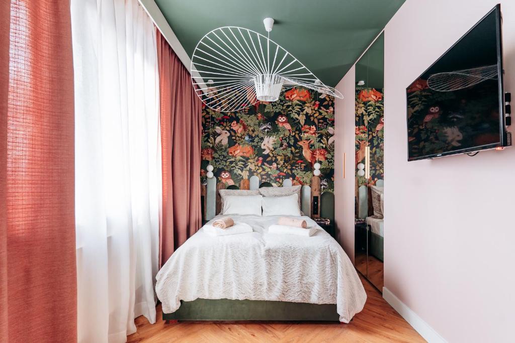 Posteľ alebo postele v izbe v ubytovaní Widokówka Apartament 12