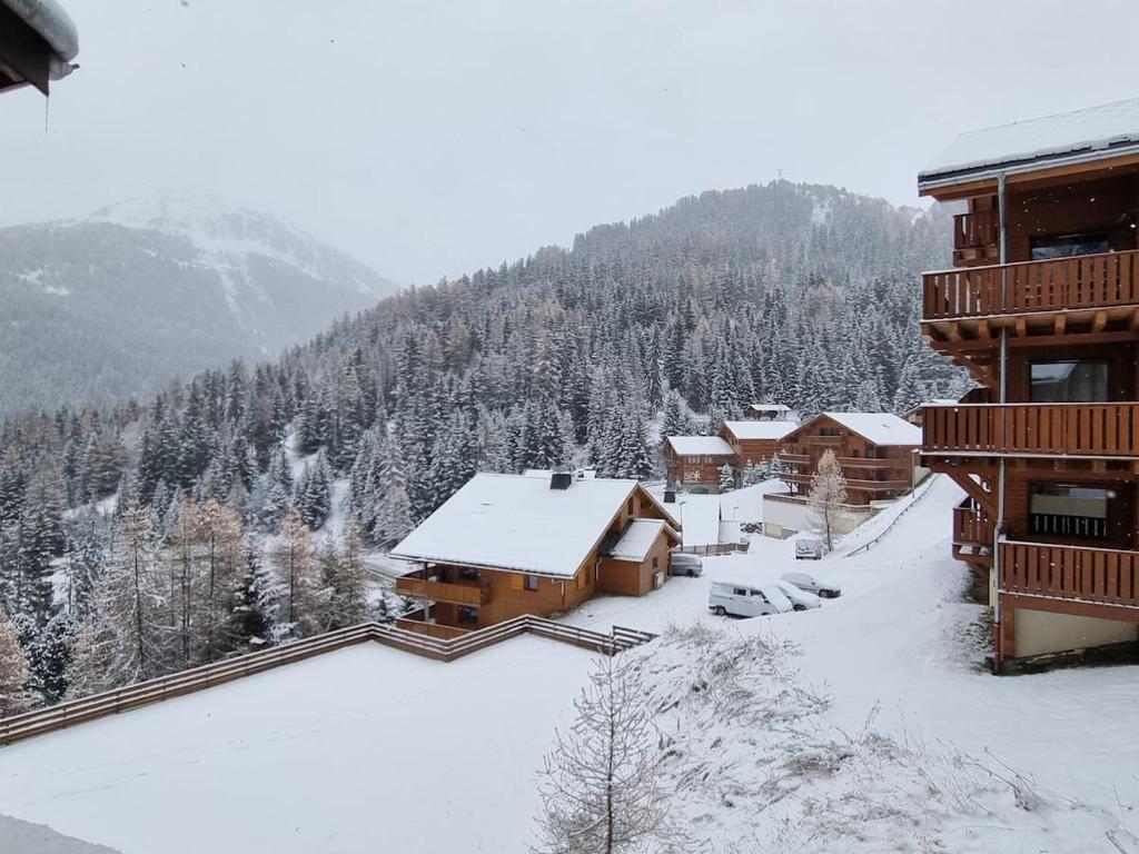 a lodge in the mountains covered in snow at The little refuge of La Plagne (French Alps) in Plagne 1800