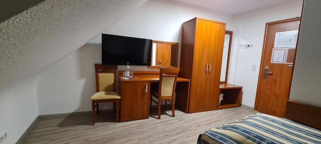 TV a/nebo společenská místnost v ubytování M-A-S-Hotel