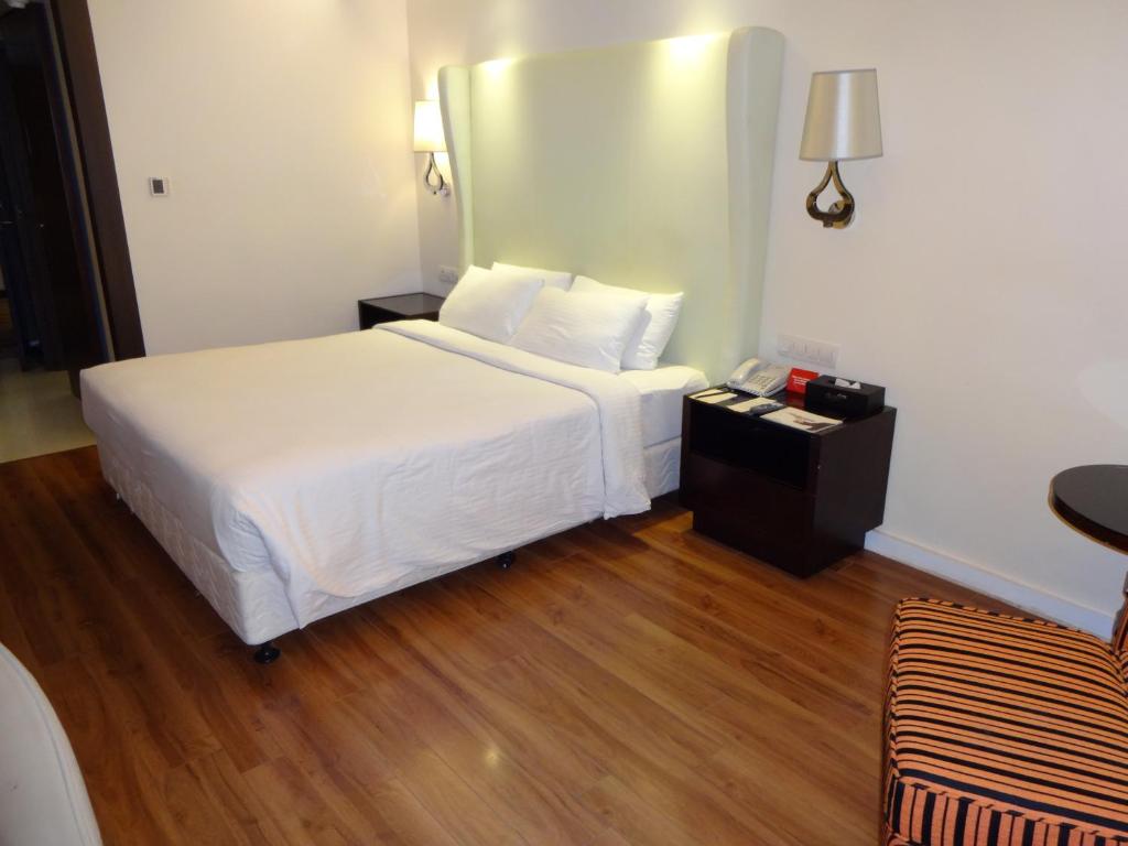 Postel nebo postele na pokoji v ubytování Savera Hotel