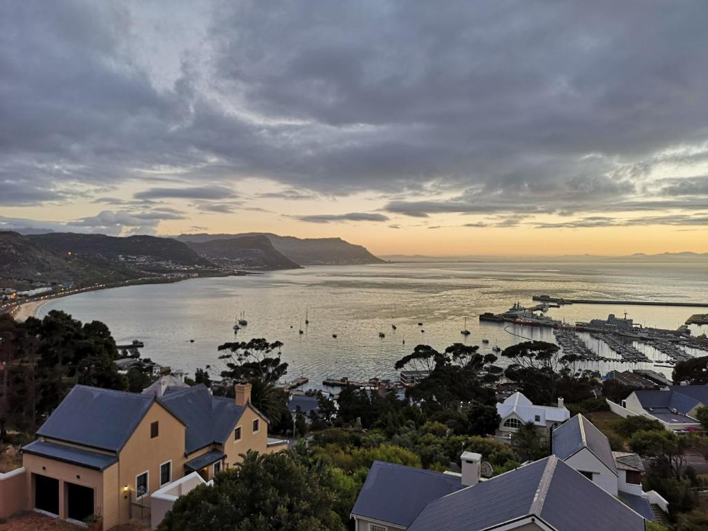 a view of a bay with boats in the water at Albatross Guest House in Simonʼs Town