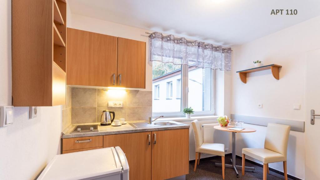Kuchyň nebo kuchyňský kout v ubytování Hotel&Wellness Knížecí rybník