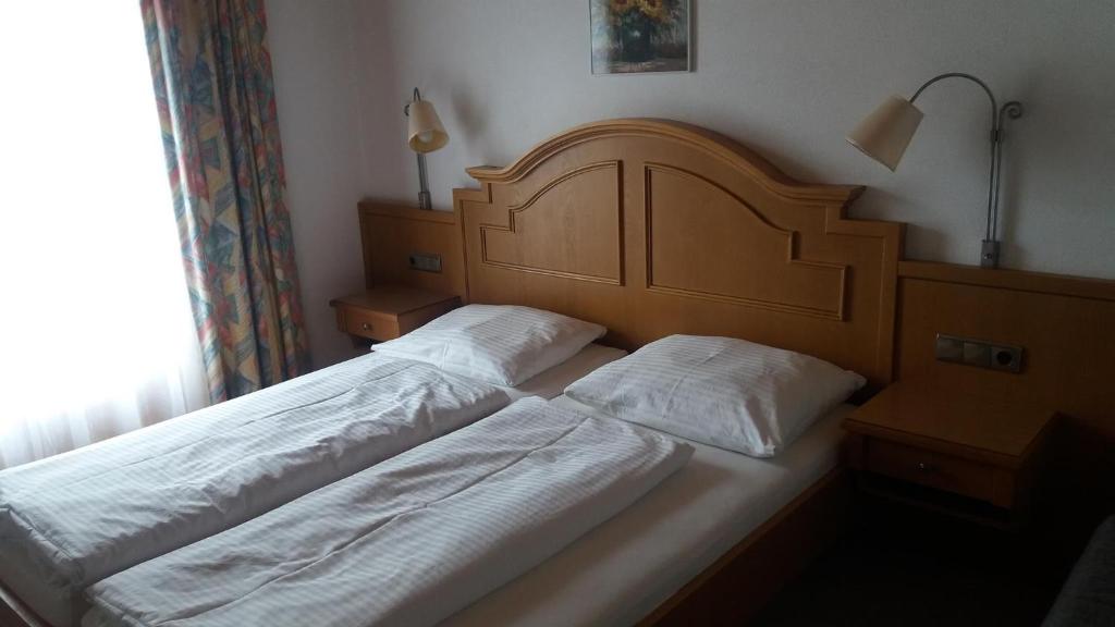 Posteľ alebo postele v izbe v ubytovaní Aue, Ferienwohnung