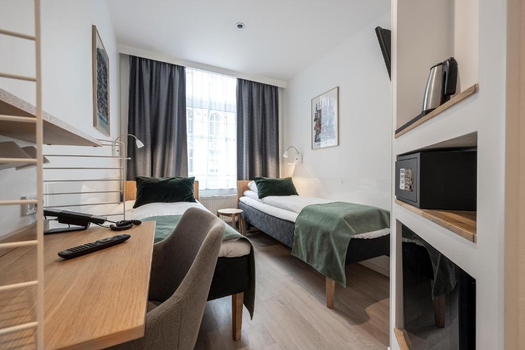 Postel nebo postele na pokoji v ubytování Go Hotel Ansgar