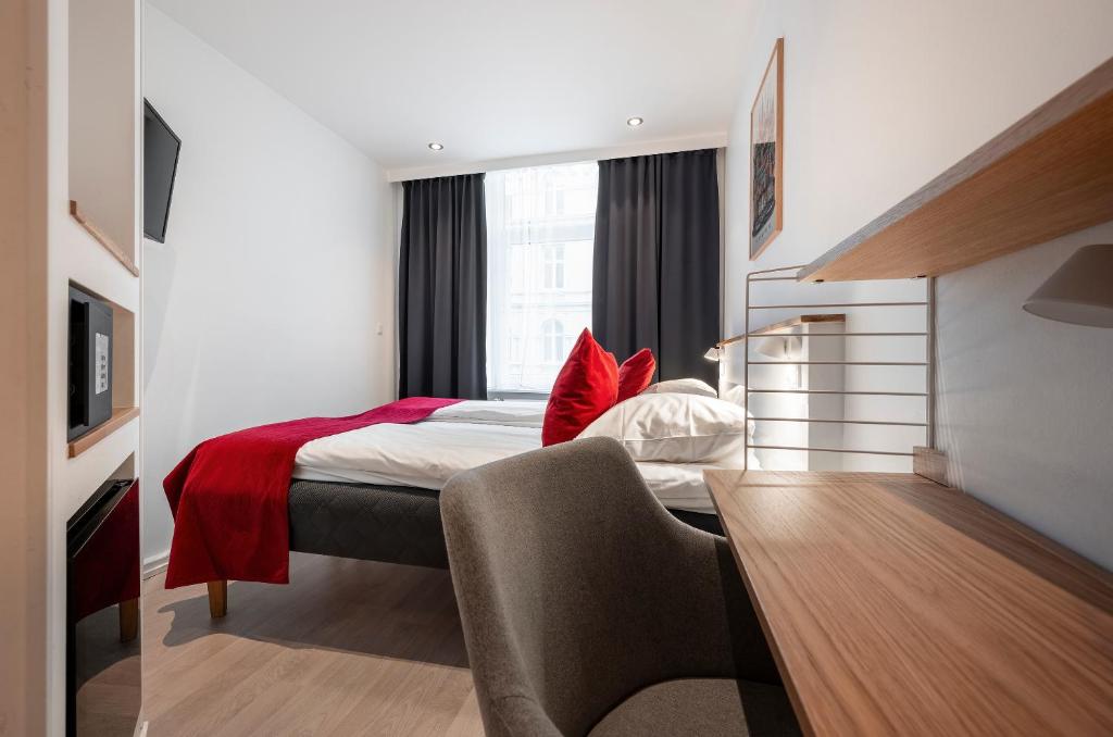 Postel nebo postele na pokoji v ubytování Go Hotel Ansgar