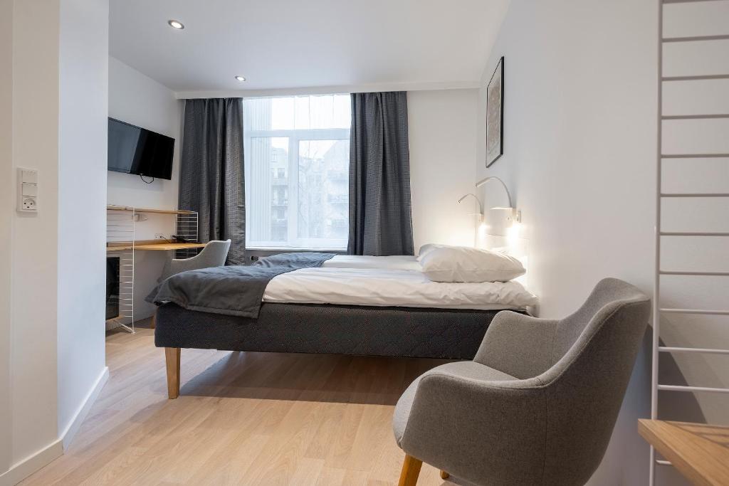 Postel nebo postele na pokoji v ubytování Go Hotel Ansgar