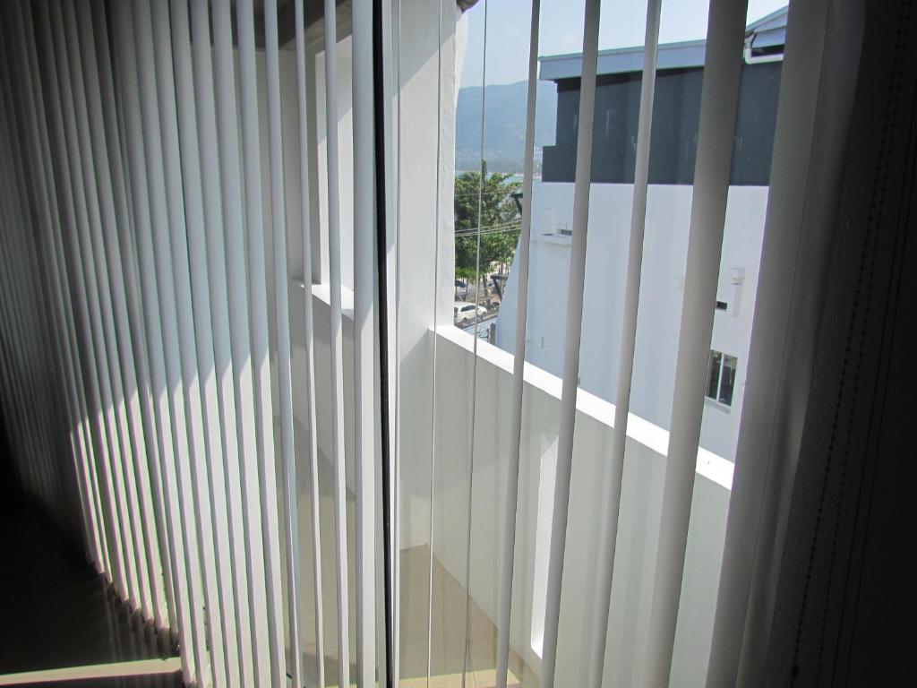 a view from a window of a building at The Front Hotel and Apartments in Patong Beach