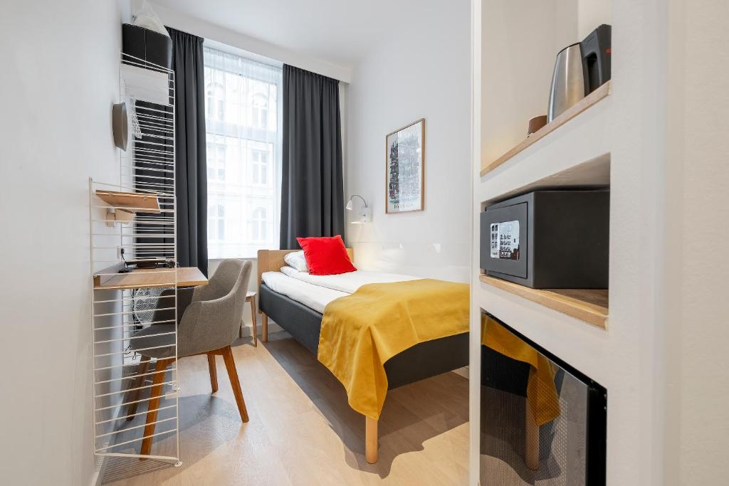 Postel nebo postele na pokoji v ubytování Go Hotel Ansgar