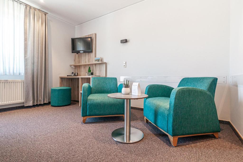 Posezení v ubytování Hotel Die Post Meerfeld