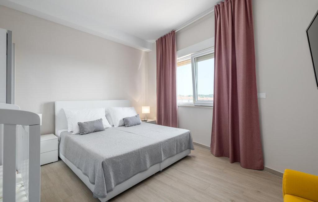Voodi või voodid majutusasutuse Villa Smile toas