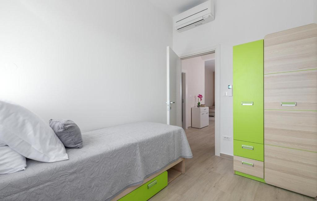 Voodi või voodid majutusasutuse Villa Smile toas