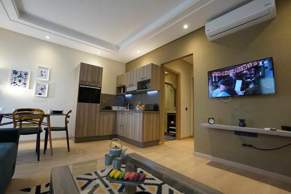 Cucina o angolo cottura di Flamant Rose Appart Hotel