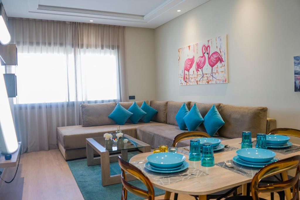 Area soggiorno di Flamant Rose Appart Hotel