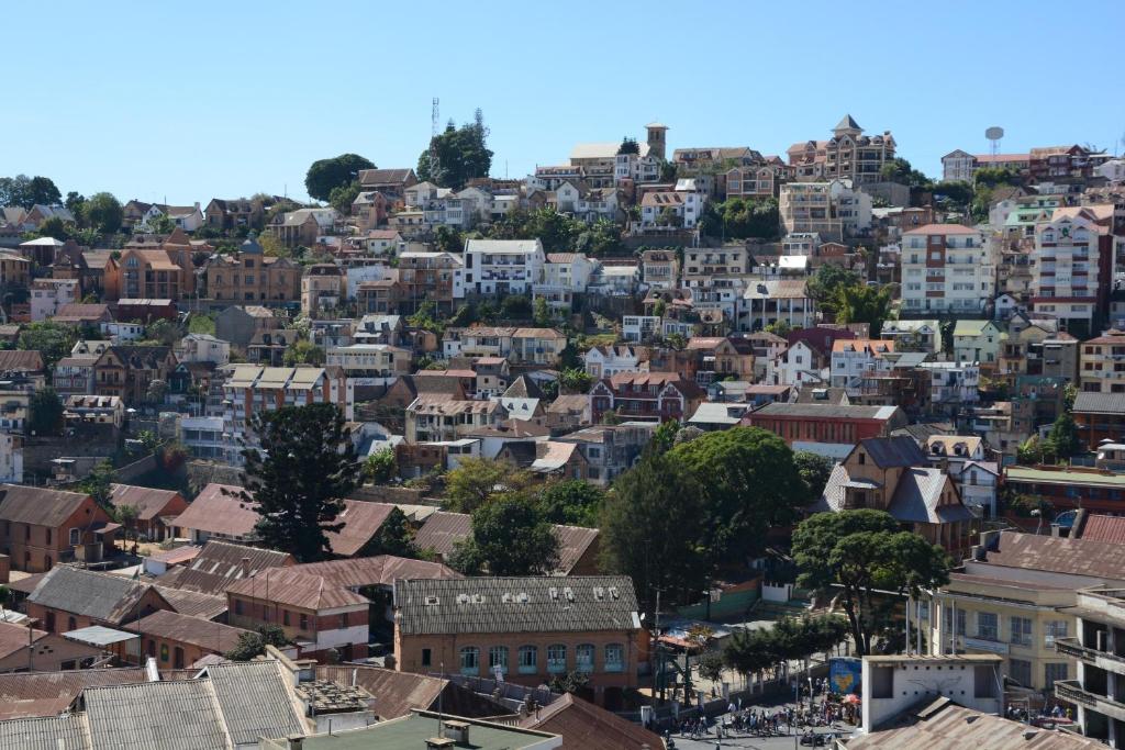 an aerial view of a city with buildings at Aina Hôtel in Antananarivo