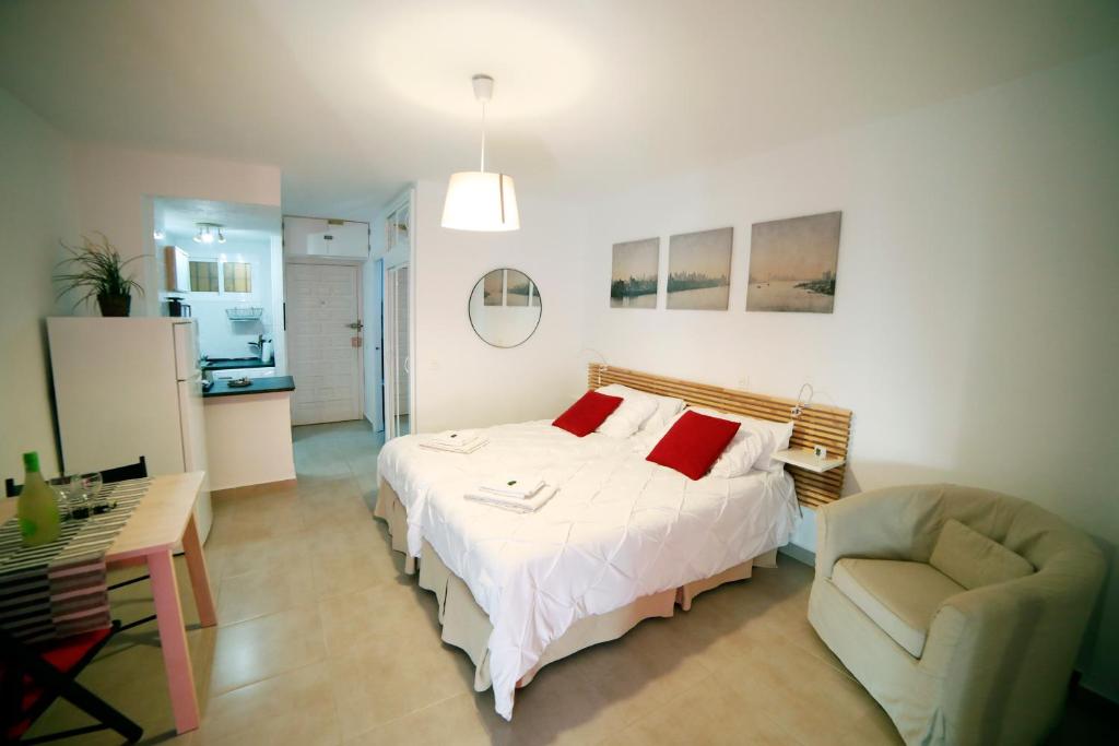 Postel nebo postele na pokoji v ubytování Apartamentos DC II