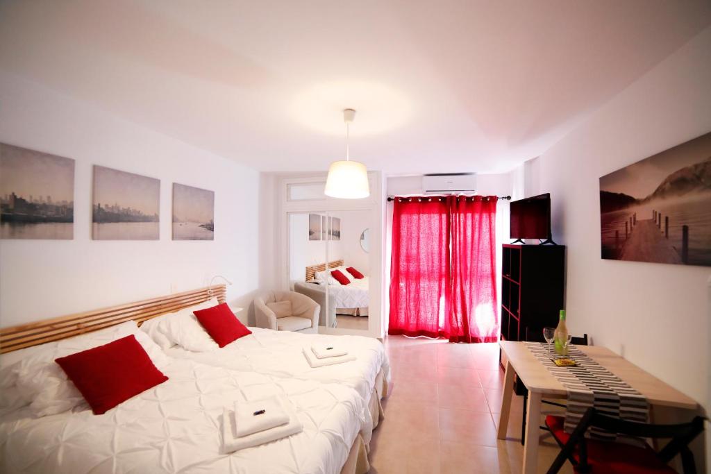 Postel nebo postele na pokoji v ubytování Apartamentos DC II