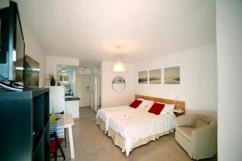 Postel nebo postele na pokoji v ubytování Apartamentos DC II