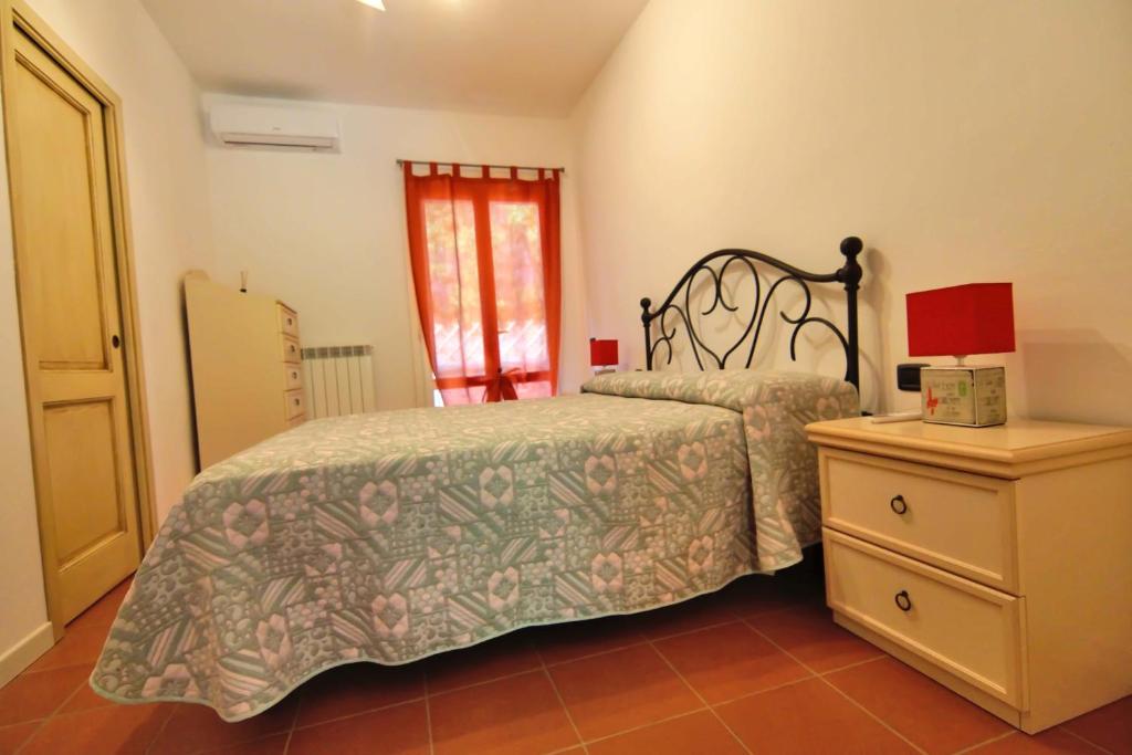 Posteľ alebo postele v izbe v ubytovaní Relais jardin San Vivaldo