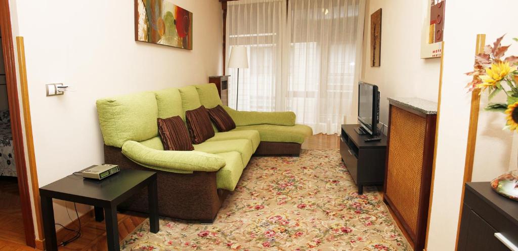 A seating area at Apartamento en el corazón de Gijón con parking incluido, VUT 78