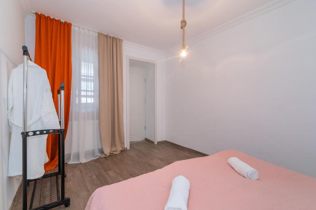 Postel nebo postele na pokoji v ubytování Guest House Check in Borjomi