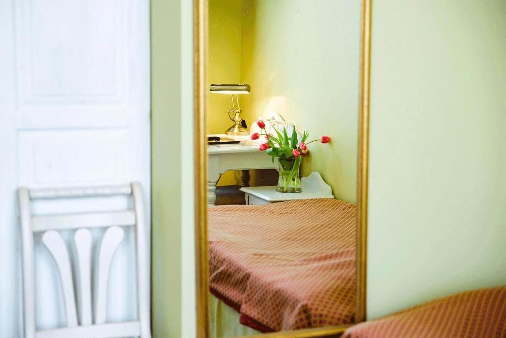 Postel nebo postele na pokoji v ubytování Hotel Metsis