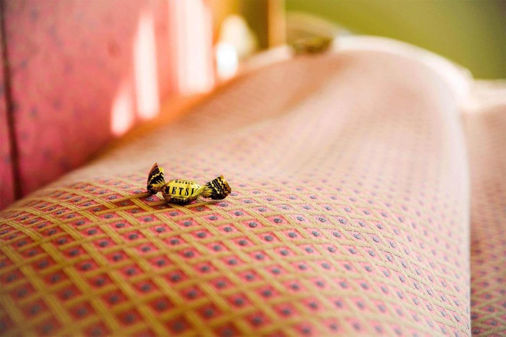 Postel nebo postele na pokoji v ubytování Hotel Metsis