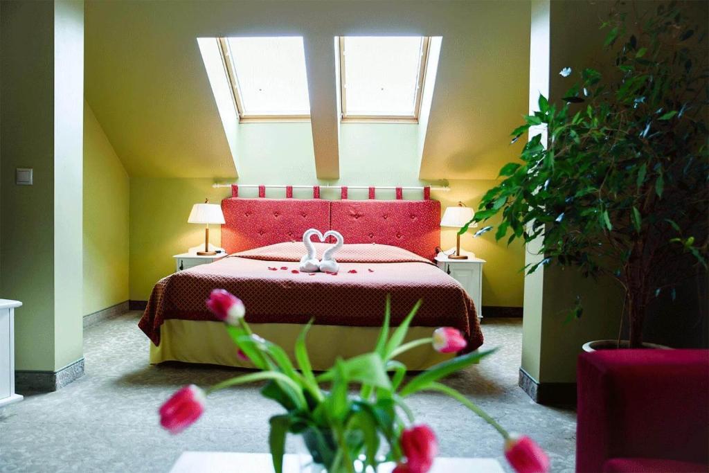 Postel nebo postele na pokoji v ubytování Hotel Metsis
