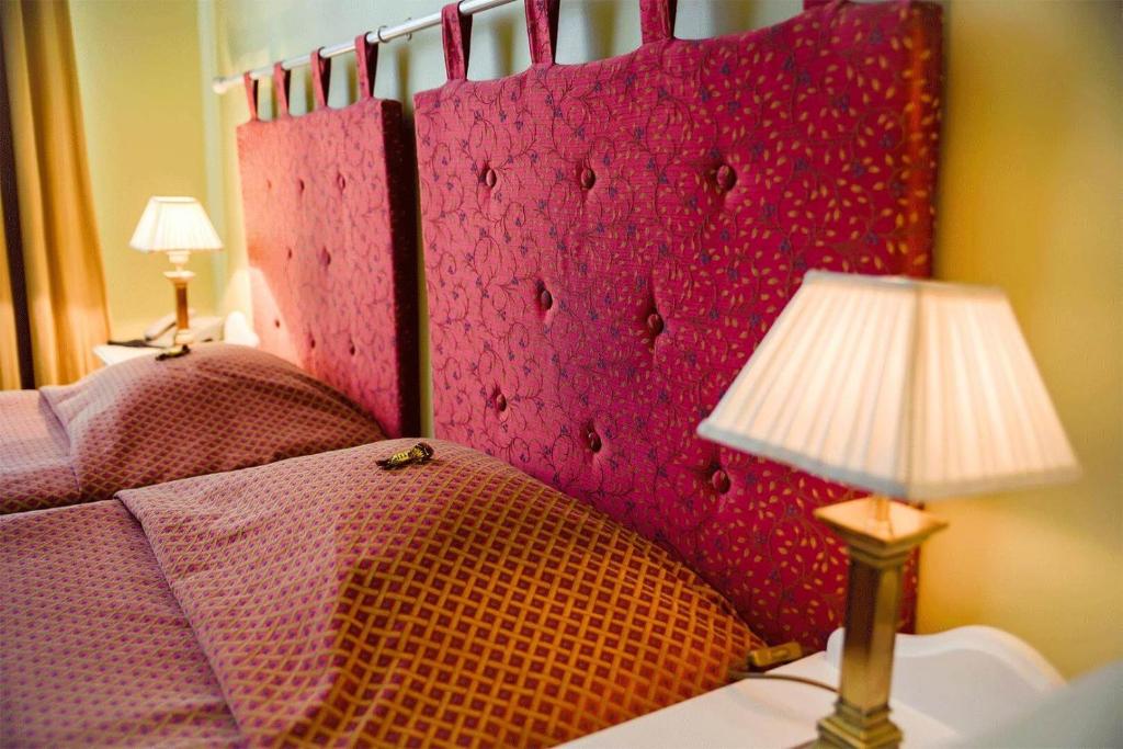 Postel nebo postele na pokoji v ubytování Hotel Metsis