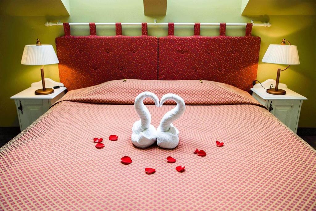 Postel nebo postele na pokoji v ubytování Hotel Metsis