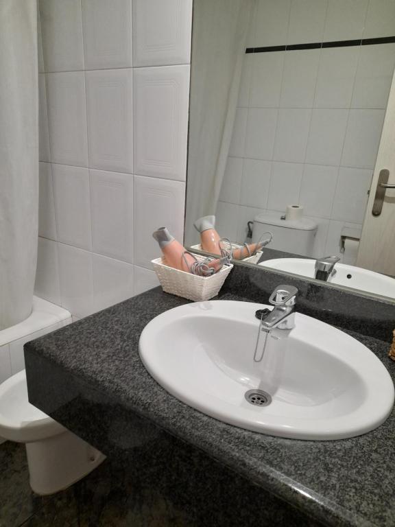 Koupelna v ubytování Hotel Giral