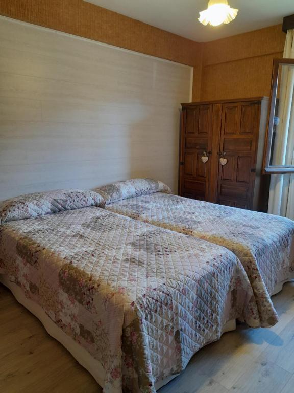 Postel nebo postele na pokoji v ubytování Hotel Giral