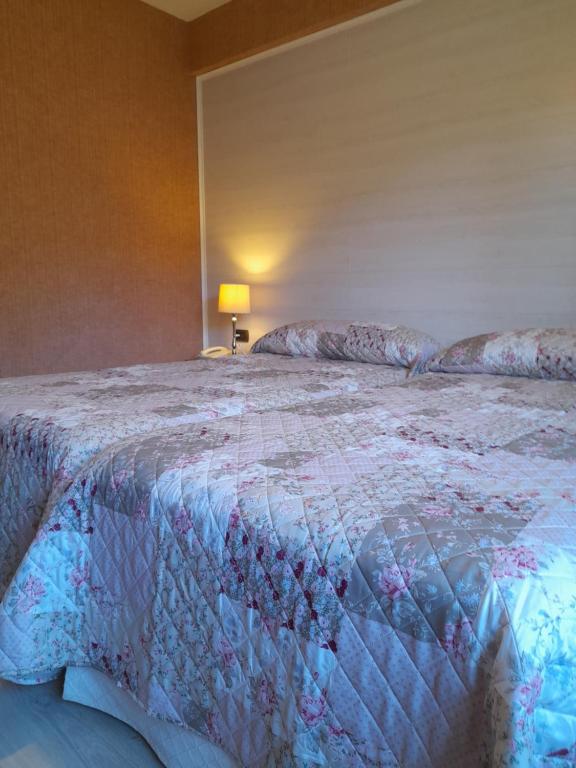 Postel nebo postele na pokoji v ubytování Hotel Giral