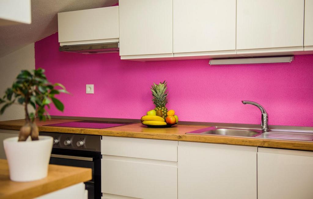 Kuchyňa alebo kuchynka v ubytovaní Apartments Mohito