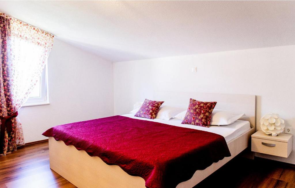 Llit o llits en una habitaci&oacute; de Apartments Mohito