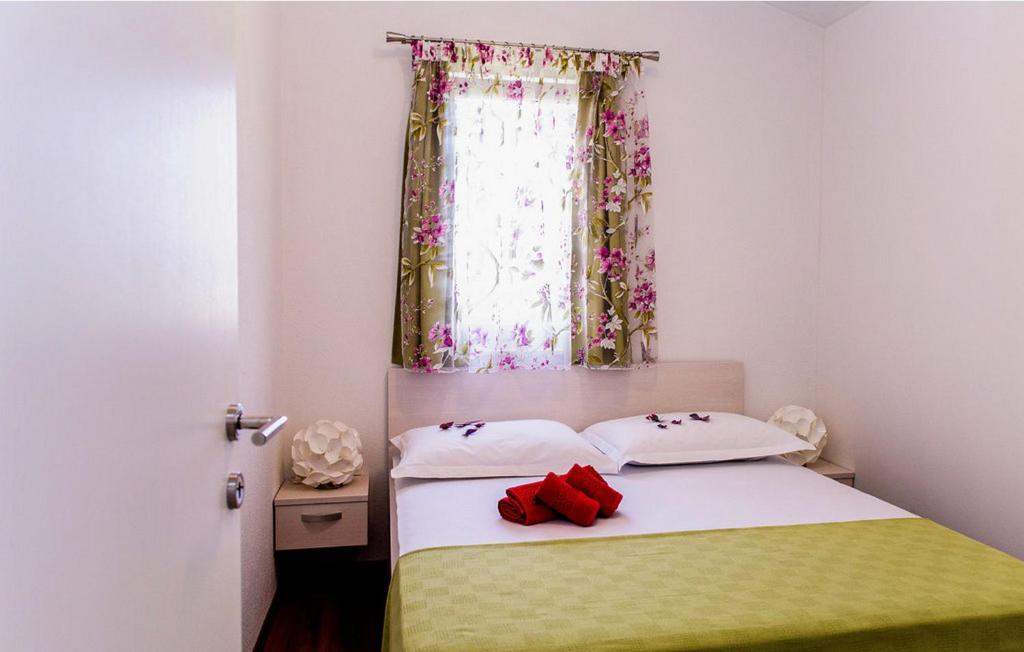 Posteľ alebo postele v izbe v ubytovaní Apartments Mohito
