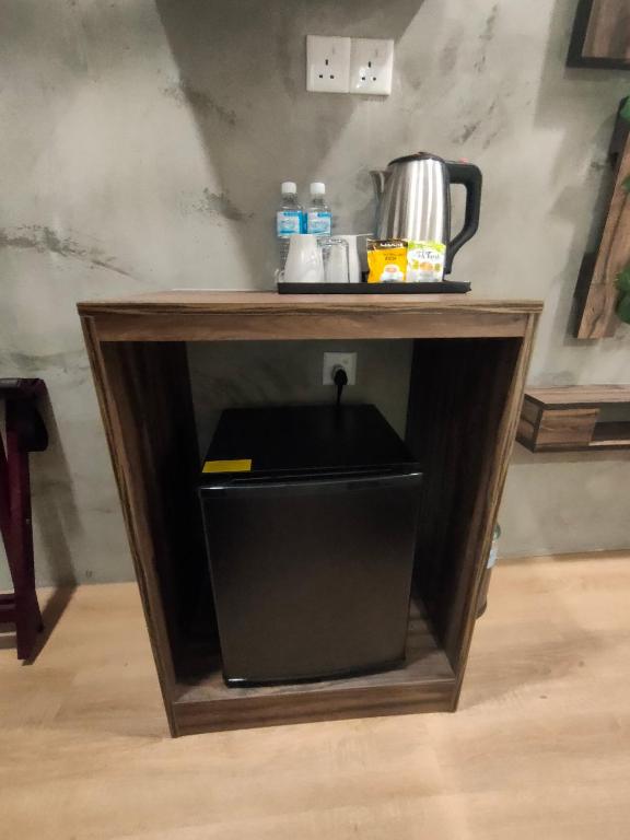 Příslušenství pro přípravu čaje a kávy v ubytování Zone Hotel Ipoh