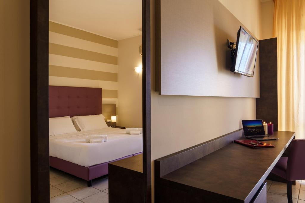 TV a/nebo společenská místnost v ubytování Hotel Tirreno
