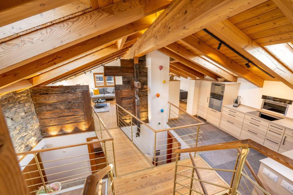 an overhead view of a kitchen with wooden ceilings at Haus Genepy in Zermatt