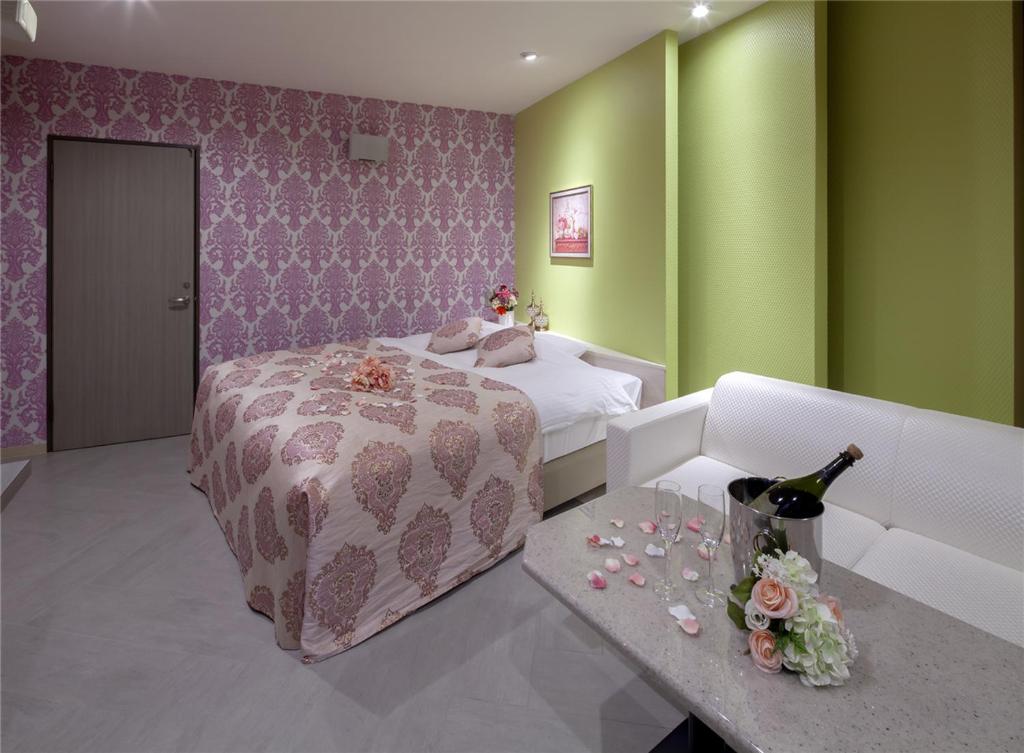 Postel nebo postele na pokoji v ubytování HOTEL xcell