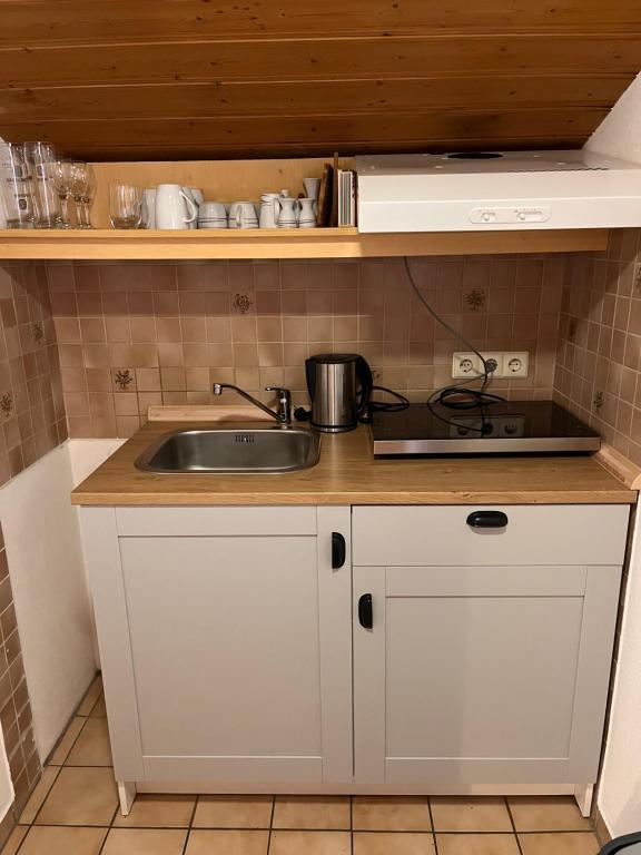 Kuchyň nebo kuchyňský kout v ubytování Hotel Löwen