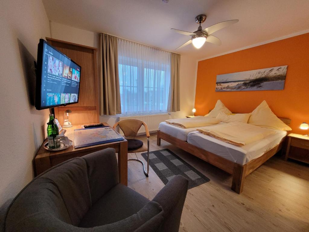 Postel nebo postele na pokoji v ubytování Naturwert Hotel Garni Ursula