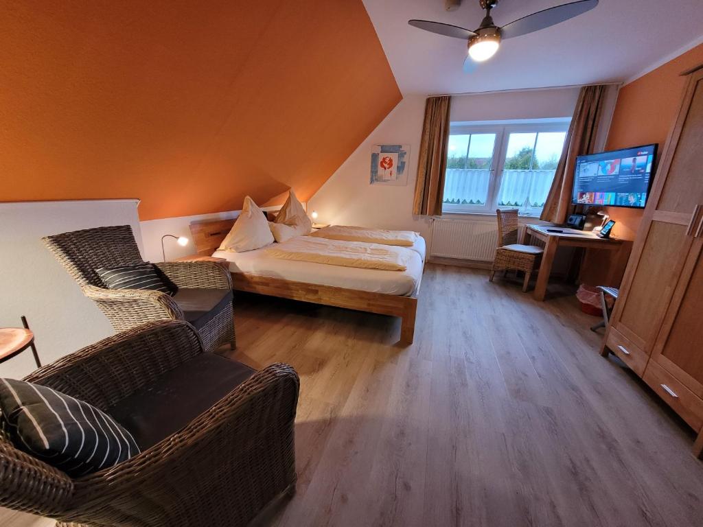 Postel nebo postele na pokoji v ubytování Naturwert Hotel Garni Ursula